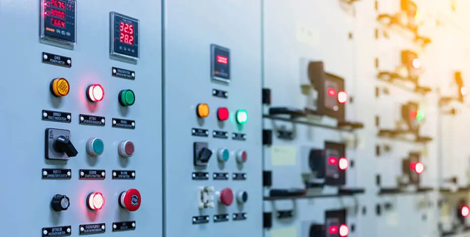 Electrical switch gear at Low Voltage motor control center cabinet in coal power plant. blurred for background.