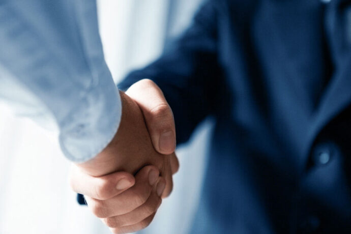 Two men giving handshake