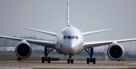 A front shot of an airplane getting ready for take off.