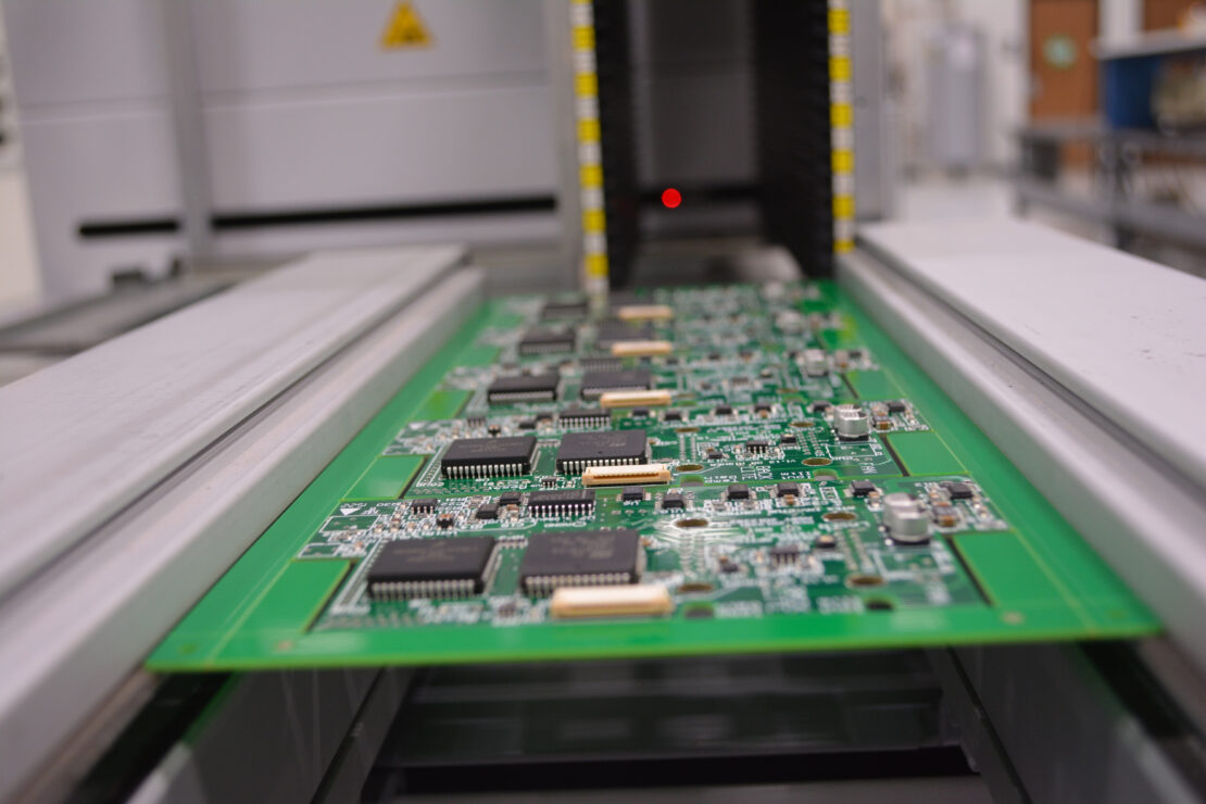 An angled shot of an already-assembled printed circuit board